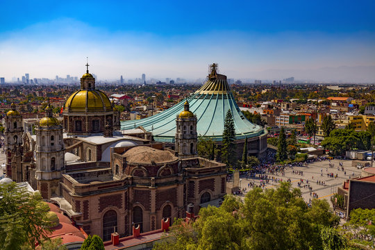 Mexico. Basilica of Our Lady of Guadalupe. The old and the new basilica, cityscape of Mexico City on the far