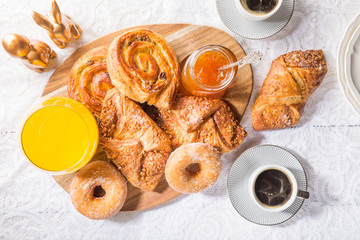 Breakfast with different French Pastries, Juice and Jam