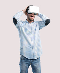 Depressed young man using a virtual reality glasses