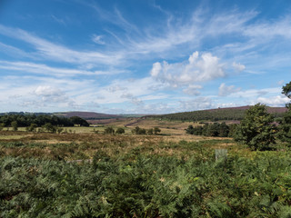 Dramatic clouds and blue sky over an English moor
