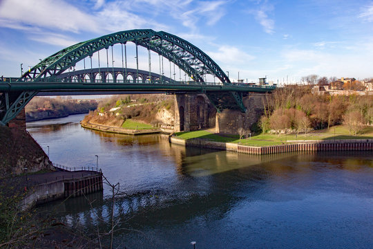 Sunderland’s iconic Wearmouth Bridge above the River Wear and the Stadium of Light in background
