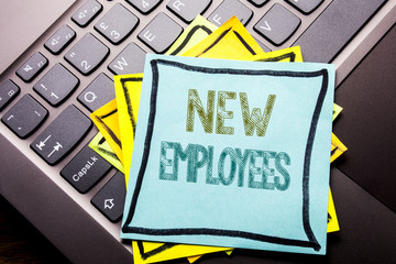 Conceptual hand writing text caption inspiration showing New Employees. Business concept for Welcome Staf Recruiting written on sticky note paper on the dark keyboard background.