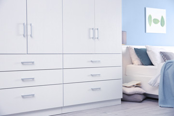 Room interior with large wardrobe closet