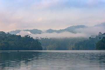 Early morning on the Cheow Lan Lake in the national park Khao Sok in Thailand