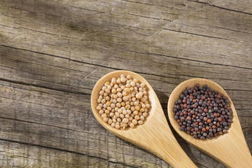 Yellow and black mustard grains