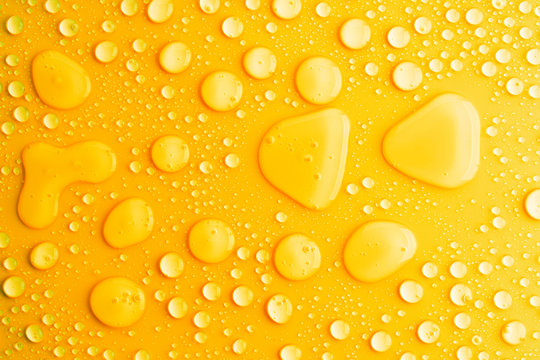 water drops yellow background Stock Photo | Adobe Stock