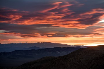 Stunning sunrise with vivid color in Death Valley National Park 