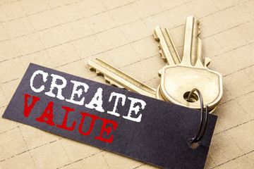 Conceptual hand writing text caption showing Create Value. Business concept for Creating Motivation written on note paper attached to the keys note paper on the texture background.