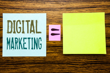 Word, writing Digital Marketing. Business concept for Business Strategy written on sticky note paper on wooden background. Equation mathematical sign for your space