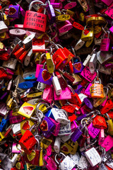VERONA, ITALY - JUNE  02, 2014: Locks attachted to the wall of Juliets house in Verona as a proof of love