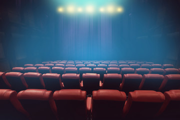 Fototapeta na wymiar empty theater auditorium or movie cinema with red seats before show time
