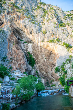 BOSNIA AND HERZEGOVINA, BLAGAJ - JUNE 01/2017: tourists visit the local attractions, water cave in the rock.