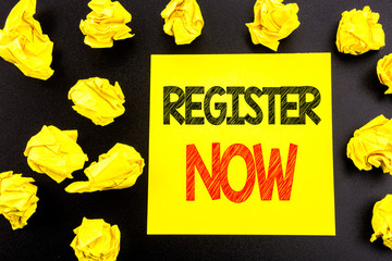 Fototapeta premium Conceptual hand writing text showing Register Now. Business concept for Registration For written on sticky note paper. Folded yellow papers on the background