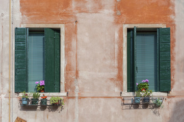 Window of old residential building in Venice, Italy