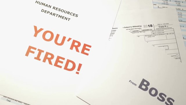 The man received a message from the HR department. The concept of job cuts and unemployment. The worker was upset and wilted
