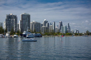 Boats on the broadwater with modern city skyline in the background