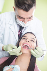 Dentist and patient in dentist office