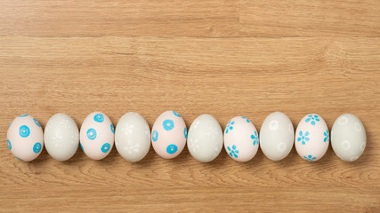 handmade easter eggs a isolated on wooden background.