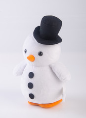 toy or funny handmade toy penguins on background.