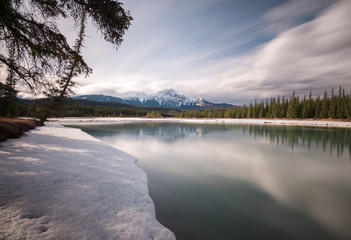 The Athabasca River flooding during the spring thaw in Jasper, Alberta