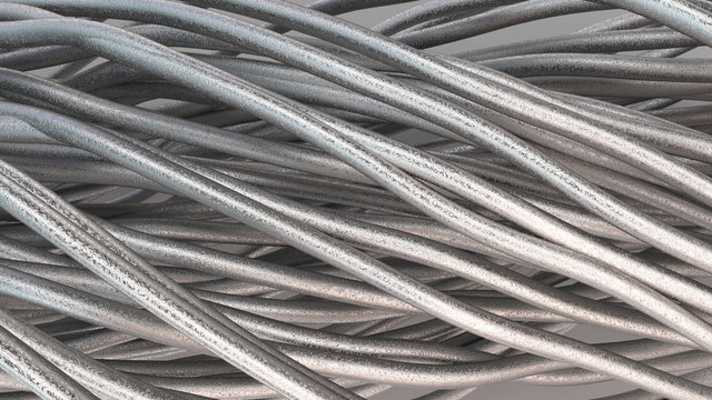 Twisted aluminum wires on white surface