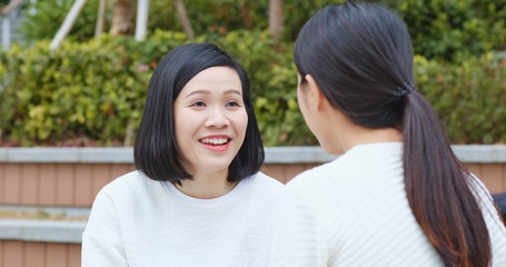 Fototapeta premium Friends chatting at outdoor