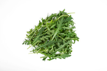 Obraz na płótnie Canvas green fresh ruccola isolated on white background, close up studio shot