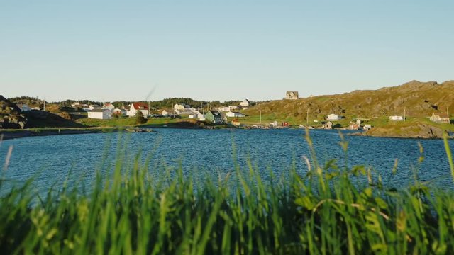 A beautiful town and ocean harbor at twillingate newfoundland sunset
