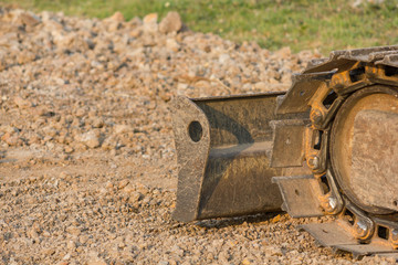 Bulldozer (Continuous Tracked Tractor) parking on soil at construction site