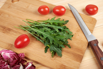 Vegetable and salad set for a healthy dietary lifestyle on a cutting board