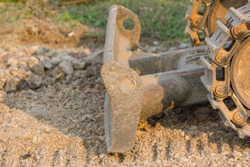 Bulldozer (Continuous Tracked Tractor) parking on soil at construction site