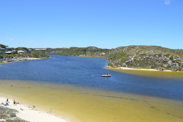 Tourism summer holiday destination western Australia Moore river white sand dark blue beach beach