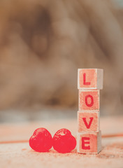 Love message written in wooden blocks.