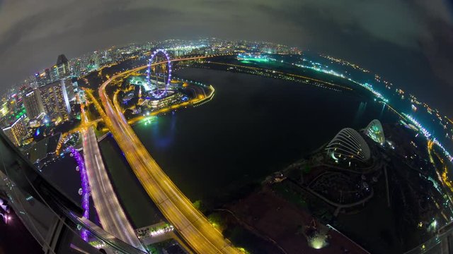 night illumination singapore famous hotel rooftop flyer bay traffic road panorama 4k timelapse
