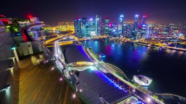 night illuminated singapore famous hotel rooftop view point marina bay panorama 4k timelapse

