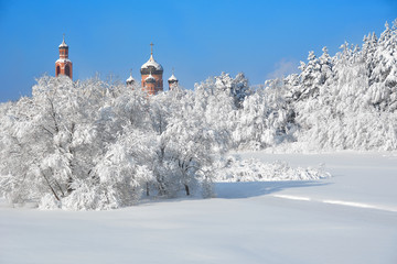 Winter landscape with monastery