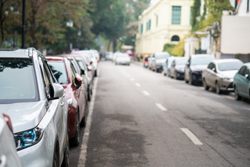 Cars parked on the urban street side
