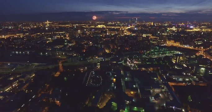 Aerial night district downtown city and salute at Moscow
