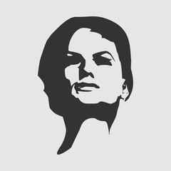 Face front view. Elegant silhouette of a female head. Short hair. Monochrome gamma.
