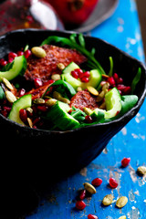 AUTUMN ARUGULA SALAD WITH CARAMELIZED SQUASH with  POMEGRANATE GINGER VINAIGRETTE