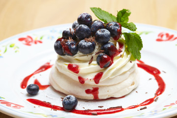 Meringue cake Pavlova with blueberry