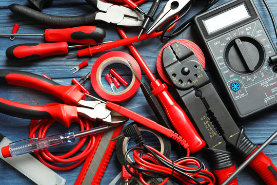 Different electrical tools on table