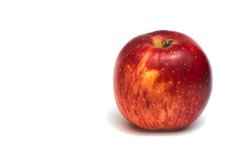 Red apple isolated on white background. Fresh raw organic fruit.