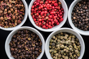 Five different pepper seeds in pots,