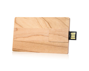 Wooden flash drive isolated on white background. USB stick made from wood material in card concept style. ( Clipping path )