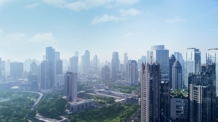 Naklejka na ściany i meble Skyscrapers with air pollution