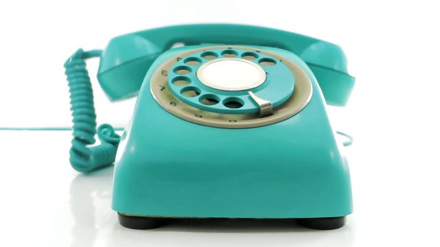 turquoise  retro phone ringing of the hook 