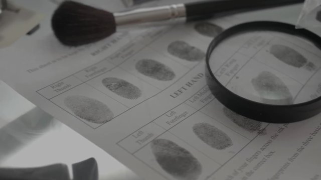Fingerprint on police fingerprint card CSI