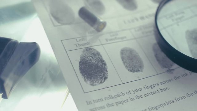 Fingerprint on police fingerprint card CSI