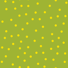 Yellow polka dots seamless pattern on green background. Magnificent classic yellow polka dots textile pattern in restrained colours. Seamless scattered confetti fall chaotic decor.